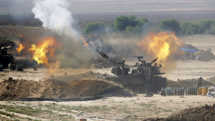 An Israeli mobile artillery unit fires towards the Gaza Strip July 28, 2014. (Reuters/Baz Ratner)